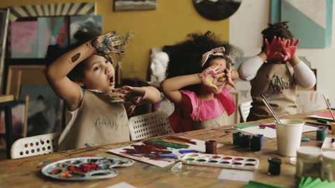 Kids Showing Their Handprints