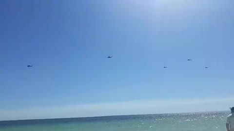 10 military choppers flying the coast Ft Walton FL