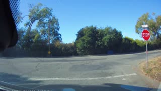 Semi-Truck Gets High Centered Pulling into Street