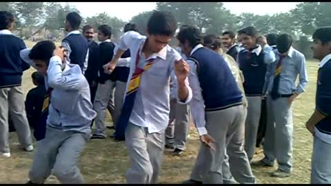 boys dancing in sports gala at college