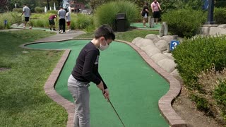 Spencer at mini golf Country Fair VID_20200815_125904