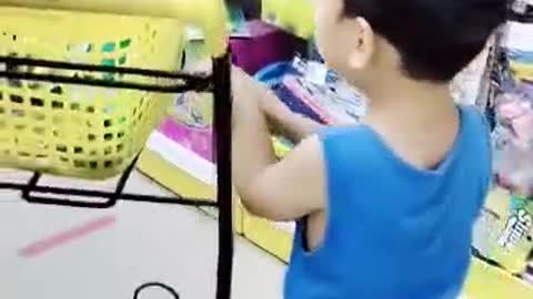 Filipino Boy Buying Toys