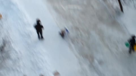 Russian children skate on the hill in -30