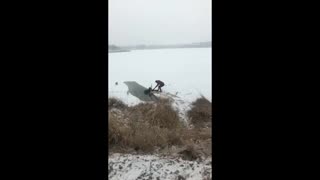 Clever Rescuers Use Table To Help Dog Walker In Icy Lake