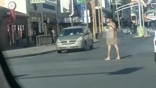 Man Strolls Down Las Vegas Street in Birthday Suit