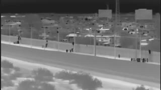 Migrants captured after dropping over border wall