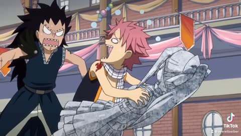 fairy tail erza turned to stone natsu tries to save her by heating her up