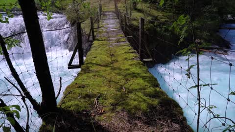 suspension bridge over the mountain river beautiful nature norway natural landscape