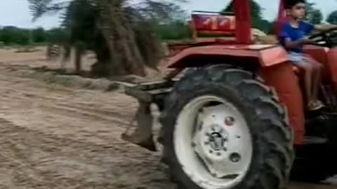 5 yrs old son driving tractor