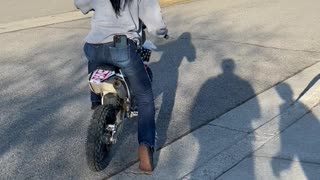 Woman Loses Control of Motorbike
