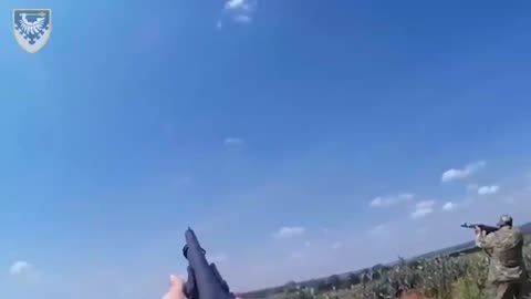 Ukranian soldiers shooting down Russian Kamikaze drone with small arms