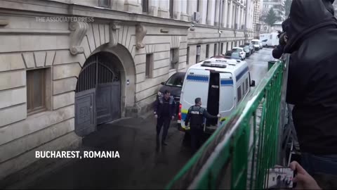 Tate detained in Romania, handed UK arrest warrant, his spokesperson says