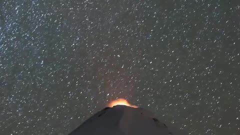 The light from Villarrica volcano in Chile beaming into the night sky captured in