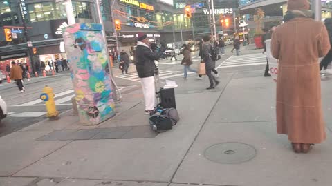 A preacher proclaiming the Gospel at Yonge & Dundas, Part 1 of 2