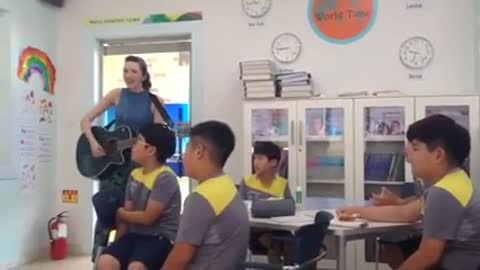 Teacher and students in Korea rehearse Justin Bieber song