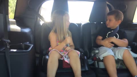 Little boy's hilarious reaction after cousin throws something at him