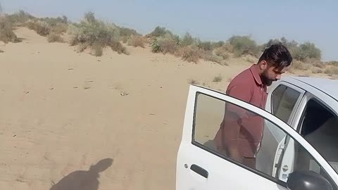 car stuck in desert