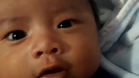 my baby boy try to talking with his mom