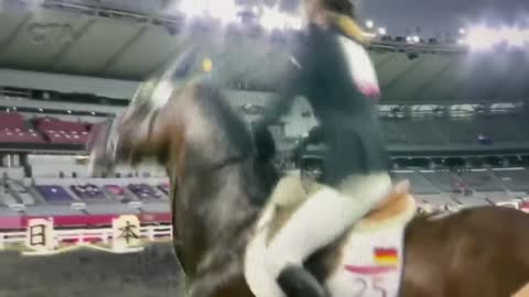 Olympic coach kicked out for punching unruly horse during competition