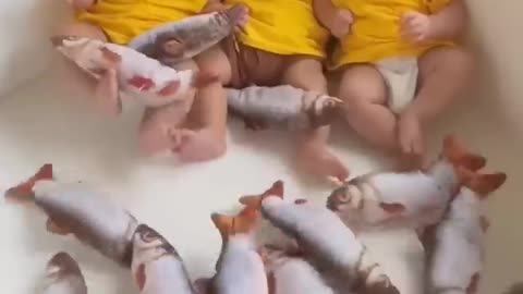 Baby's fish play dance