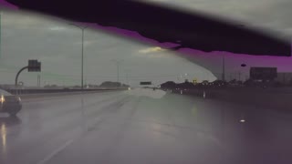 Car Spins Out on Slippery Highway