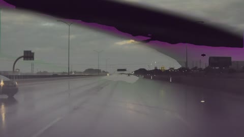Car Spins Out on Slippery Highway