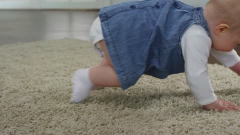 Cute Baby Crawling On The Floor