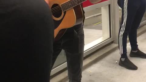 Guitarist guy present in subway