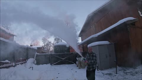 Using a super soaker to spray colored water at -52 below zero