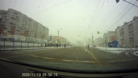 Speeding Taxi Miraculously Misses Pedestrians