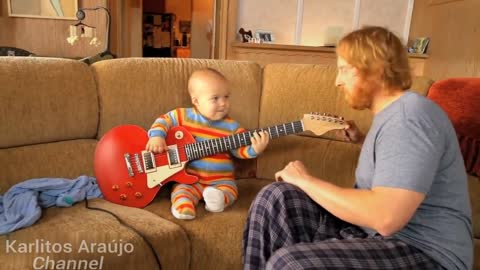 Amazing video of Baby plays Guitar
