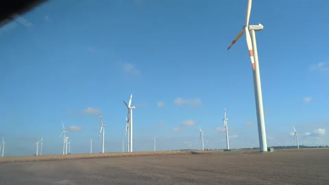 Something Seems OFF With These Wind Turbines. Can You Tell What's Wrong?