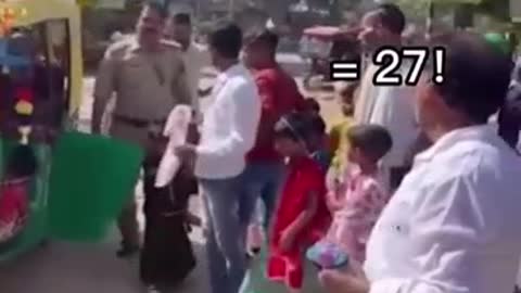 A speeding motor tricycle in India was carrying 27 passengers