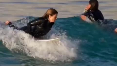 woman sea surfing