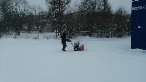The man decided to clear the snow from the street.