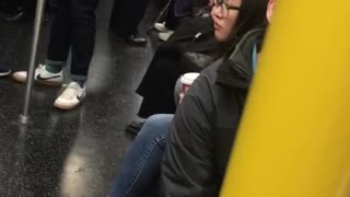 Woman red hair brushing teeth on train