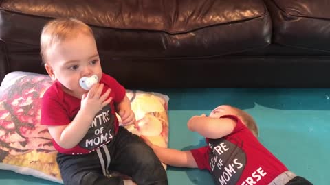 Hilarious identical twins fighting over TWO binkies
