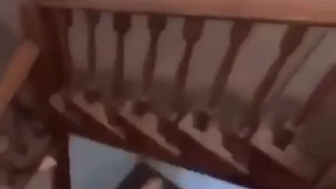 Guy jumps over banister