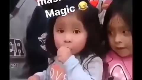 Small Child Demonstrates Magic w/Mask