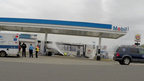 Gas Station Collapses on a Fireman