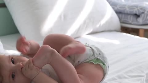 baby playing with feet part2