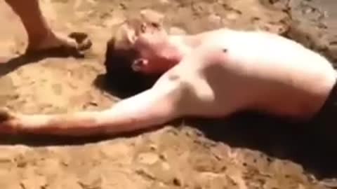 Drunk friend dares to be slapped with a fish at the river!