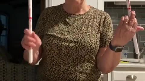 This grandma is going to teach us how to play a drum roll
