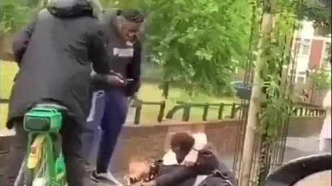 A police officer attempting to make an arrest is attacked, and bystanders