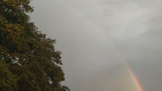 DOUBLE RAINBOW CUTS THE CLOUDS