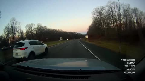 Impatient Driver Tries Passing on Shoulder and Crashes