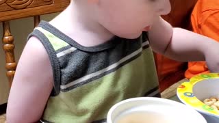 Cute toddler boy calls mom crazy