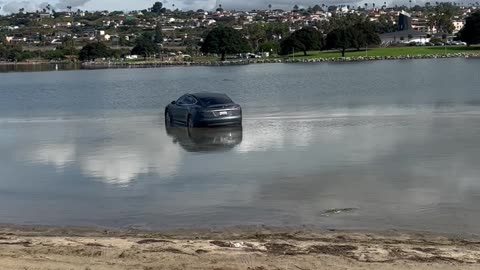 King Tide Turns Car To Island