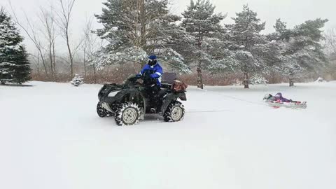 WINTER FUN: 4-WHEELER'S SNOW TUBE PULL FOR KIDS