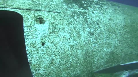 Underwater plane wreck freediving inside passenger cabin of The Lockhead L-1011 TriStar plane.